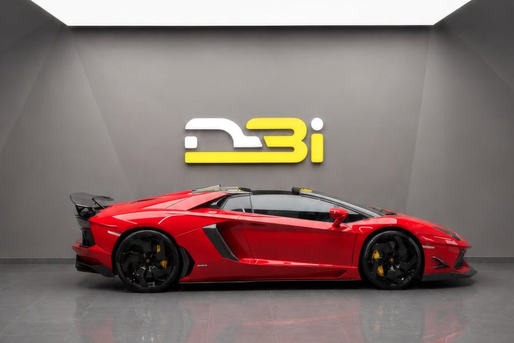 Red Lamborghini Aventador in the DBI showroom